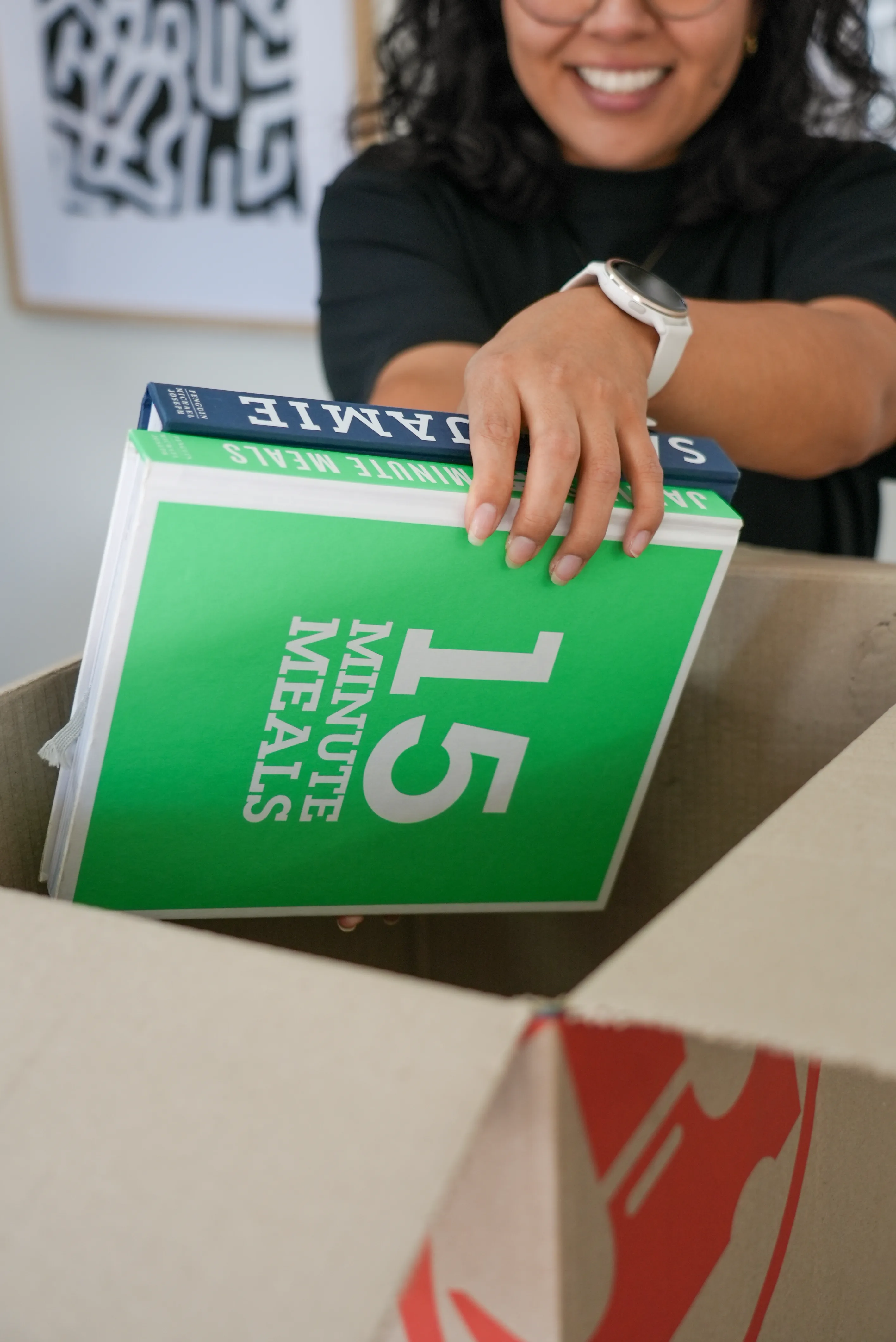KangPack packing team carefully packing fragile items into boxes
